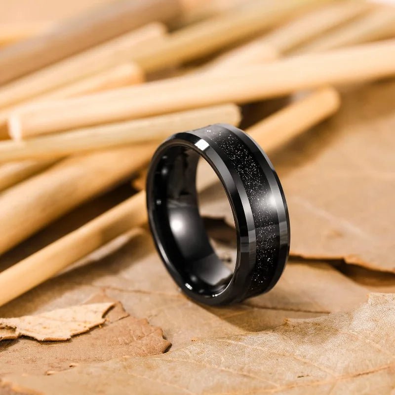 A sleek black tungsten ring with a shimmering glitter inlay — designed for men who appreciate elegance with a bold, modern edge. - BritShade
