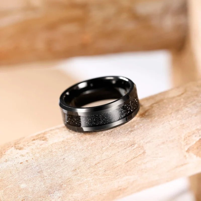 A sleek black tungsten ring with a shimmering glitter inlay — designed for men who appreciate elegance with a bold, modern edge. - BritShade